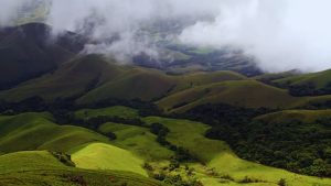 Bangalore to Chikmagalur, Chikmagalur itinerary, Chikmagalur road trip, Bangalore weekend getaway, Mullayanagiri trek, Hebbe Falls, Chikmagalur travel guide, Chikmagalur tourism, coffee estate tour Chikmagalur, places to visit in Chikmagalur, Hirekolale Lake, Baba Budangiri, Western Ghats road trip, Karnataka weekend trips, Chikmagalur from Bangalore
